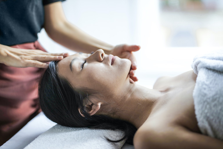 selective-focus-photo-of-woman-getting-a-head-massage-768