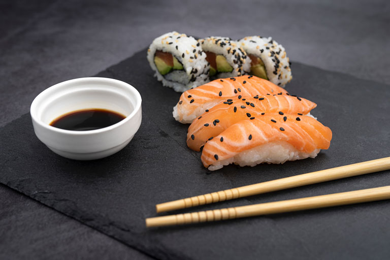 Sushi-plate-with-chopsticks-and-soya-souce
