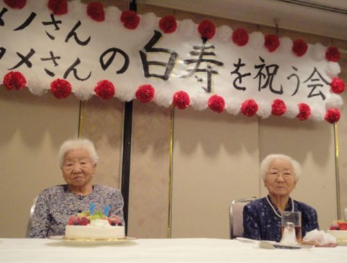 Koume (left) and Umeno (right) celebrating their 99th birthday