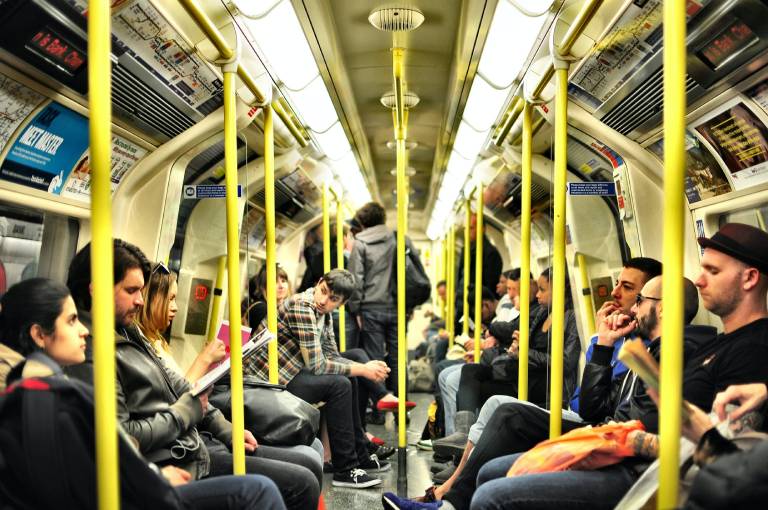 group on people sitting inside train